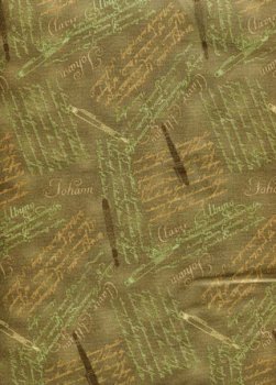Schrift und Schreibfedern auf Grün