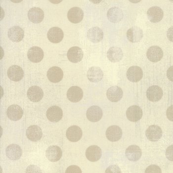 Hellbraune Punkte auf Beige gefleckt