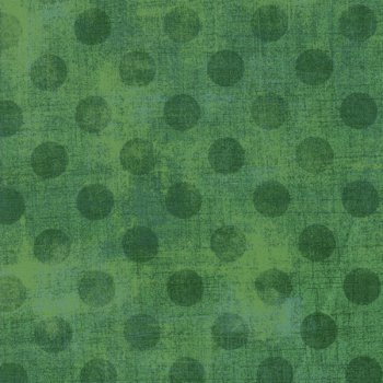 Spinatgrüne Punkte auf Grasgrün gefleckt