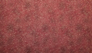 Kleine goldene Punkte und Sterne auf rot