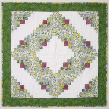 Log Cabin Frühlingsquilt - kleine Decke