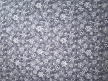 Weiße Schneeflocken auf Grau