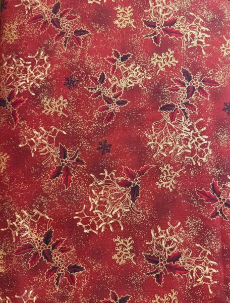 Roter Ilex mit Gold auf Dunkelrot