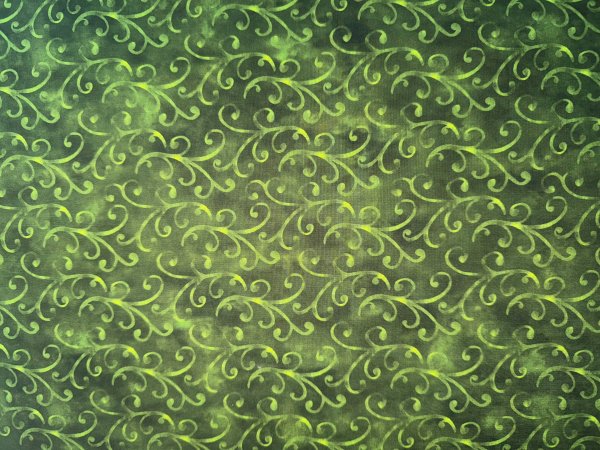 Grüne weihnachtliche Schnörkel auf Grün