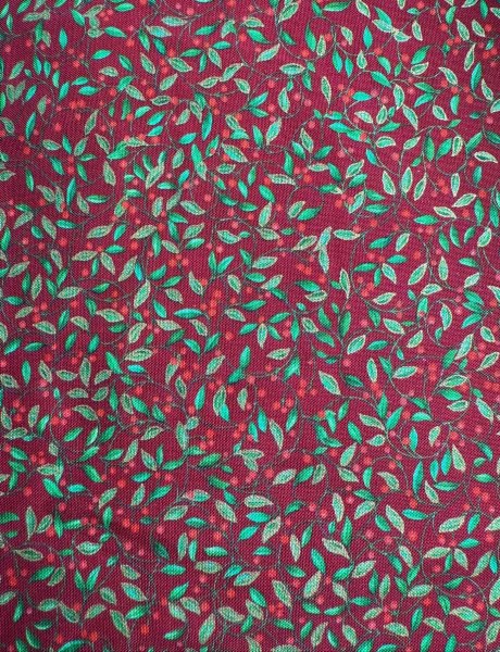 kleine Ranken mit Beeren und Gold auf Rot